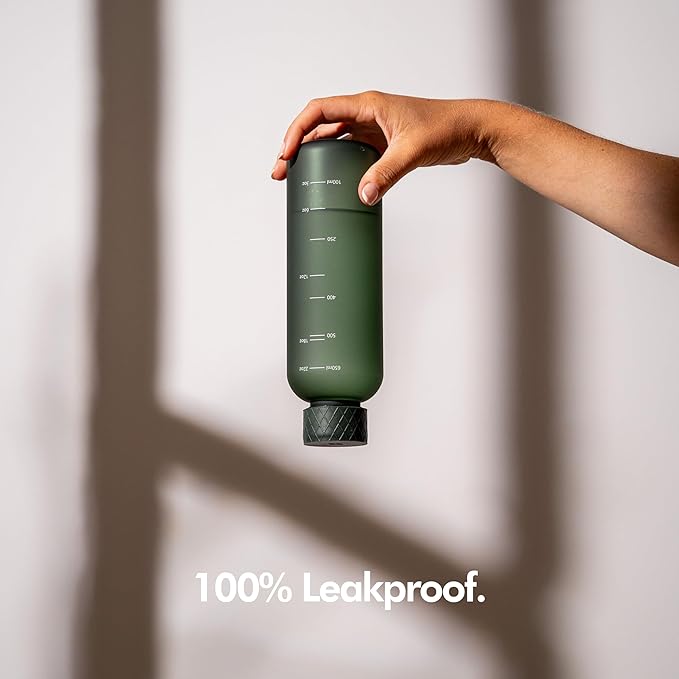 KIVY Slim Water Bottle 22oz [Lightweight & Shatterproof] - Small Drinking Waterbottle - Clear Water Bottle Without Straw for School, Sport & Travel - Transparent Bottle Dishwasher Safe, BPA Free